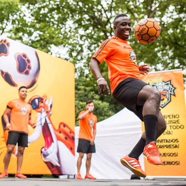 soccer player juggling a soccer ball