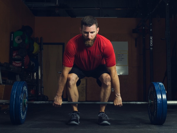Man lifting barbell