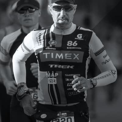 Runner with jersey covered in sponsor logos